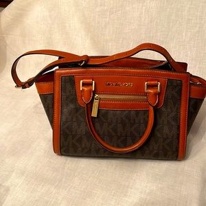 Michael Kors logo hand bag.